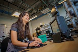 Student interacting with robot