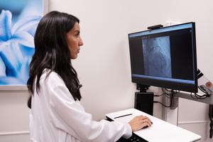 Study lead author Dr. Priya Freaney looking at a coronary angiogram