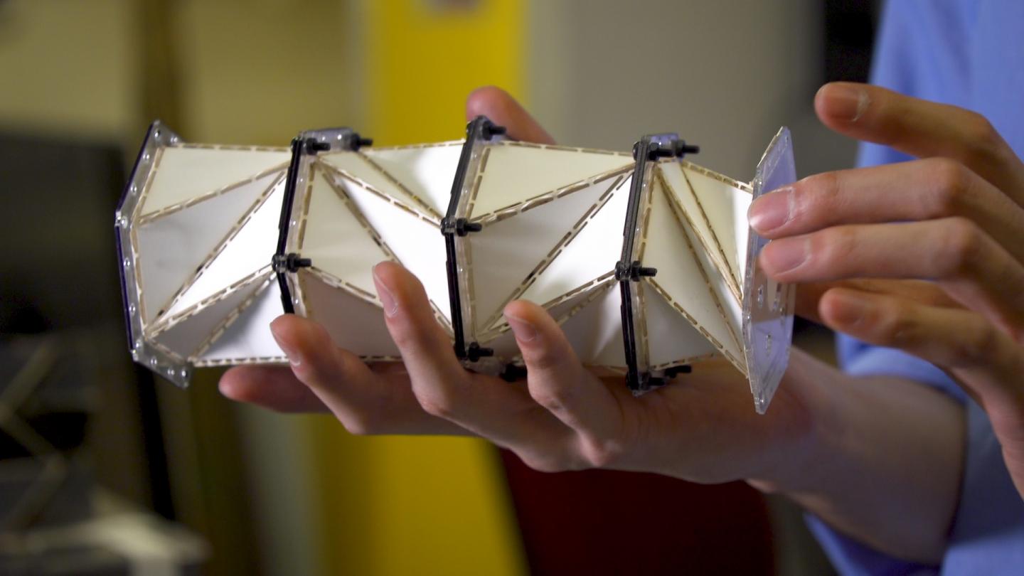 Origami-Based Impact Mitigation via Rarefaction Solitary Wave Creation (6 of 6)
