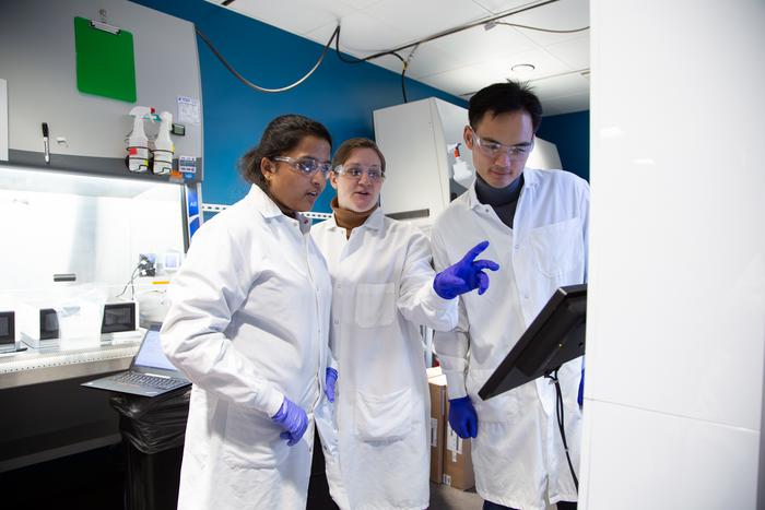 Scientists observing data collection at Allen Institute.