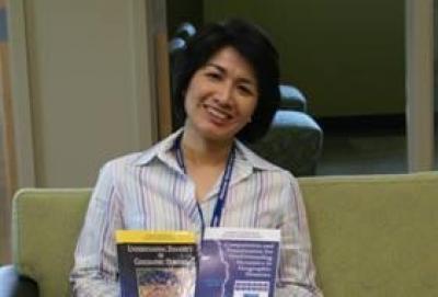May Yuan with Books
