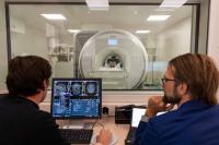 Dr Philip Koch and Professor Friedhelm Hummel performing an MRI.