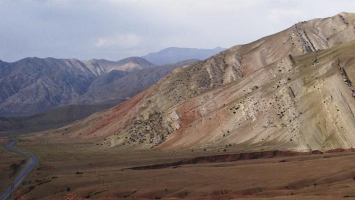 Tilted sedimentary strata in the Tian Shan, driven by the ongoing indentation of India into Asia credit Stijn Glorie