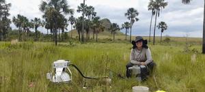 Larissa Verona measures greenhouse gas emissions from the soil using the LI-COR instrument.