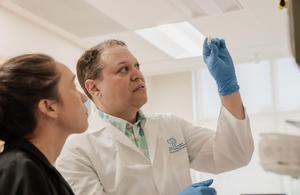 Professor Alika Maunakea and research faculty Riley Wells