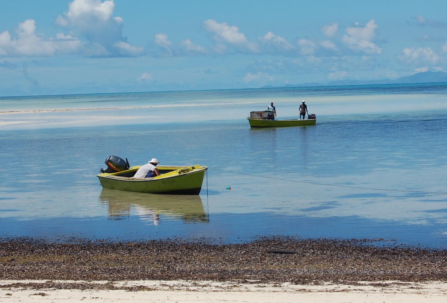 Seychellois Coral Reef Fisher Returning with Catch