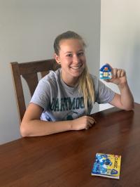 Student with the Finished Figurine