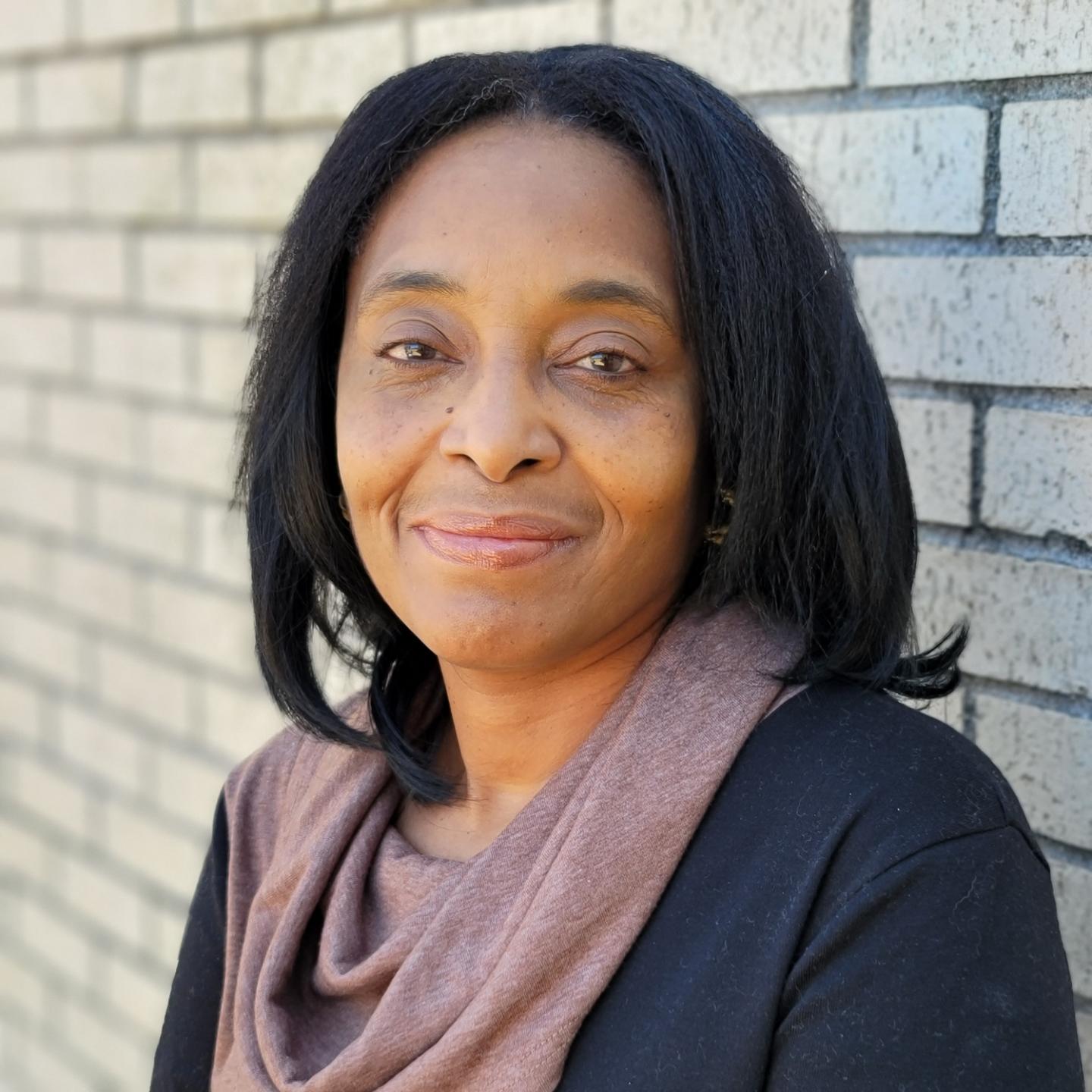 Dr. Faith Atai
