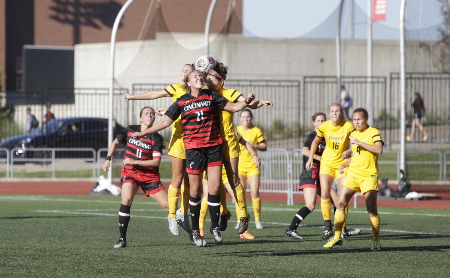 Soccer Players Heading the Ball in a Game at University of Cincinnati