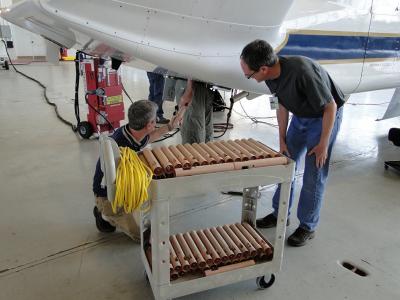 Team Loads Dropsondes on HS3 Mission Global Hawk