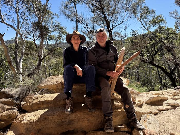 Dr Amy Way and Wayne Brennan, rock art specialist, in the Blue Mountains
