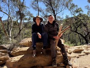 Dr Amy Way and Wayne Brennan, rock art specialist, in the Blue Mountains