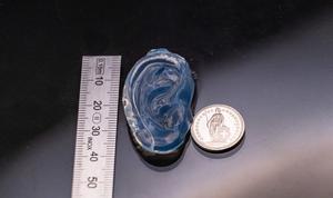 Human ear model printed in a gelatin-based resin using holographic VAM. 2026 LAPD EPFL CC BY SA