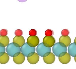 An ion strikes molybdenum disulfide