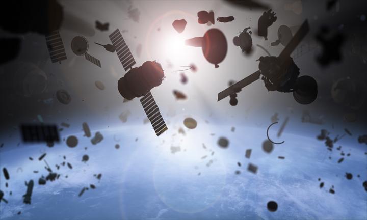 A Deorbit Kit for Satellites Based on Low Work-Function Tethers