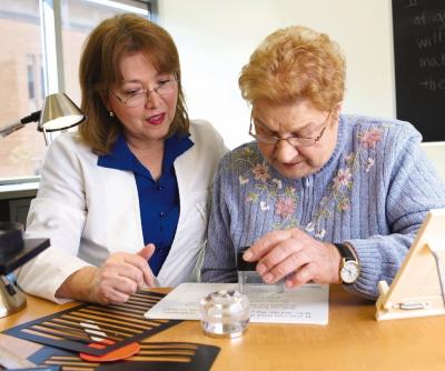 Occupational Therapist and Low-Vision Patient