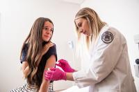 Photo Illustration: Someone Getting a Shot