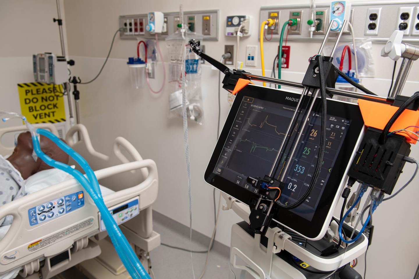 Robotic Device Controls Ventilator From Outside Room