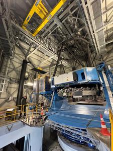 The PLACID Instrument is lifted into place.