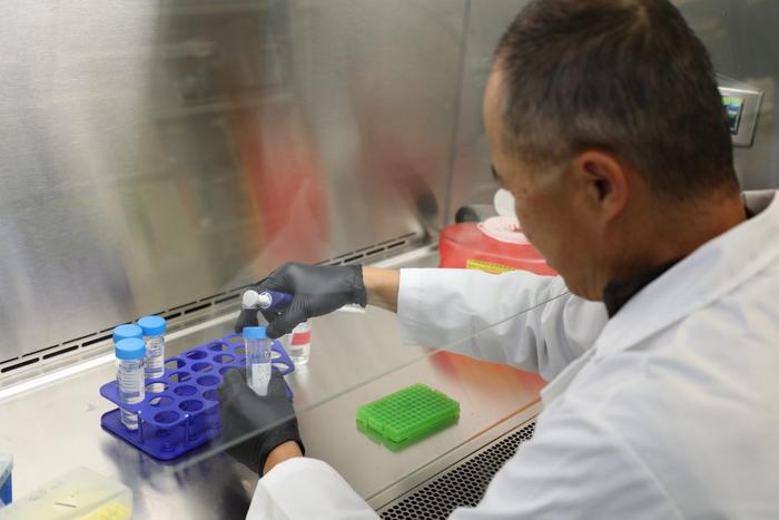 Mike Zhang works on an experimental opioid vaccine that he hopes will be a useful tool in the fight against the ongoing opioid crisis.