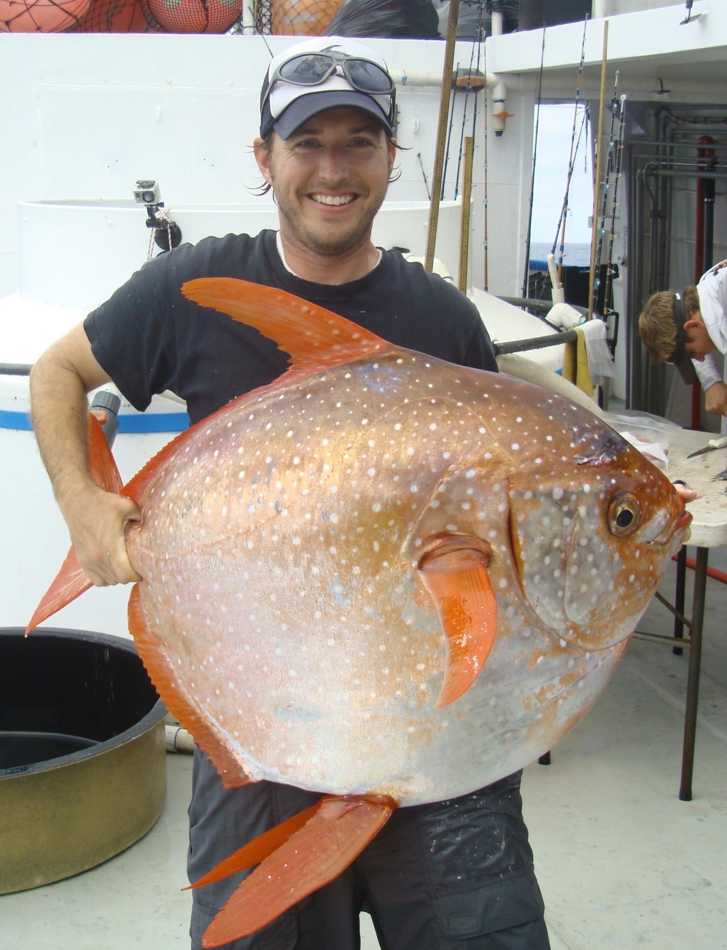 Holding an Opah