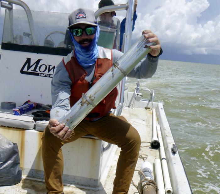 William Bailey with sediment core