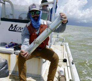 William Bailey with sediment core