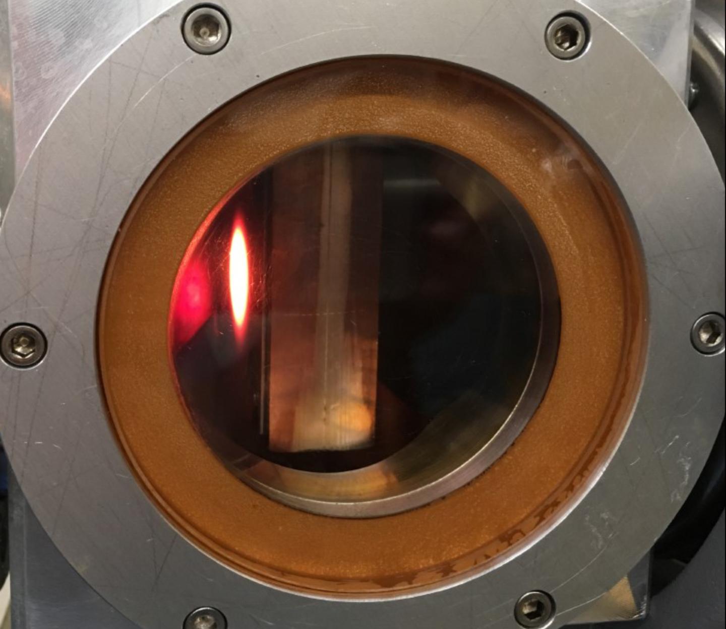 More than 2 kilowatts of Proton Beam Impinging on the Water-cooled, Tungsten-reinforced Beam
