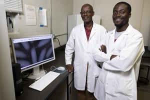 Griffiths Atungulu and Samuel Olaoni with X-rayed rice