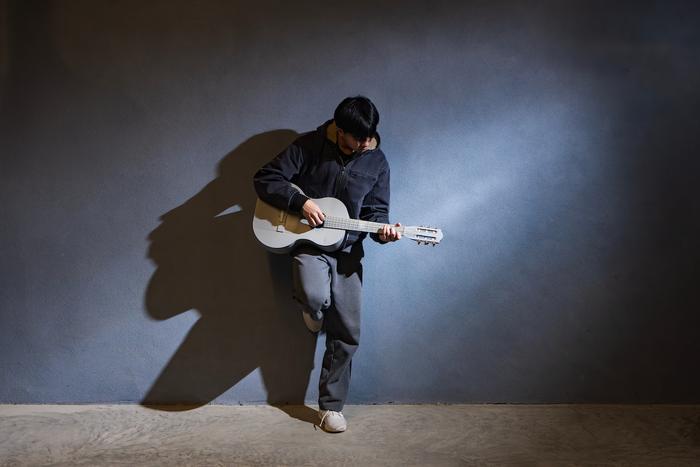 Timothy Tran with guitar