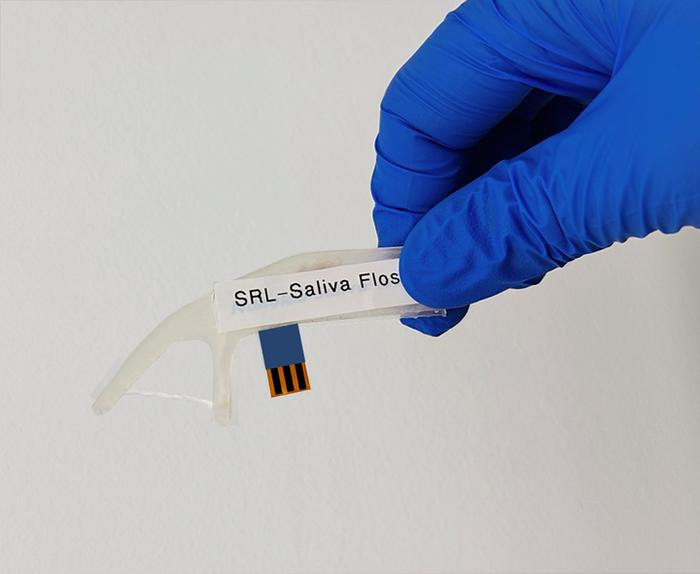 Dental floss pick stress sensor