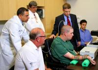 Doctors and Researchers Watch Intently