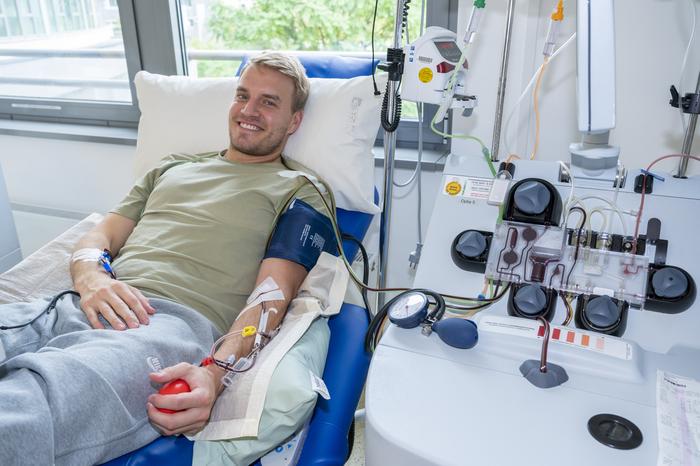 Young stem cell donor at the DKMS Collection Center in Cologne