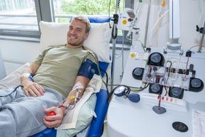 Young stem cell donor at the DKMS Collection Center in Cologne