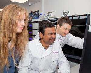 Dr. Patil, Dr. Lindell, and Drs Lindell, Patil and Blasche in laboratory.