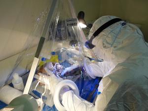 Helena Malmström sampling at the Florisbad research station.