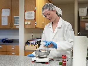 researcher mixing spices in a lab