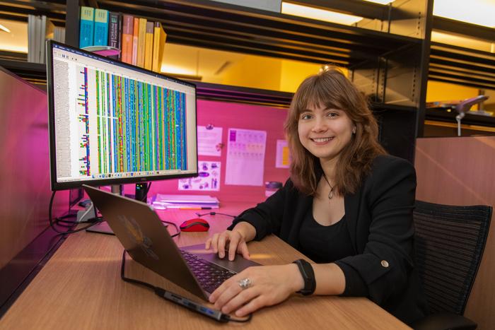 Lada Isakova studying protein sequences