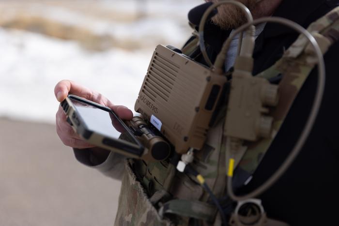 An Idaho National Laboratory expert demonstrates the use of a WSComm device.