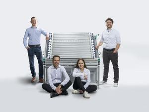 The photreon team with the prototype photoreactor panel (one square meter) for the production of pure solar hydrogen. From left: A. Dreher, P. Kant, M. Cordts, M. Rubin (photo: Amadeus Bramsiepe, KIT)
