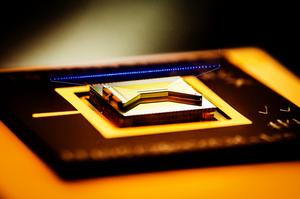 A closeup view of a surface ion trap used in quantum computing technology