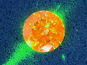Diamond containing NV colour centres on a blue background (2)