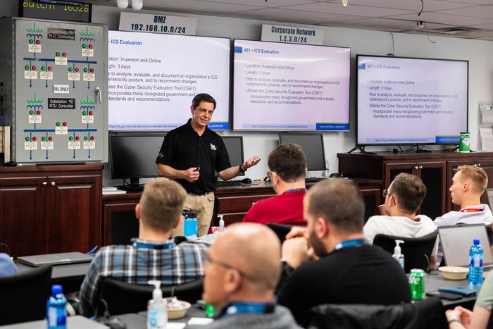 Jeff Hahn, director of Idaho National Laboratory’s ICS Cybersecurity Lab Training (ICS 301), talks to a class at the program’s facility on Lindsay Boulevard.