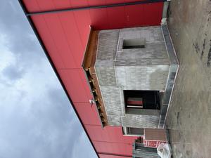 The building, rebuilt following its dismantling. The walls are still in good condition.