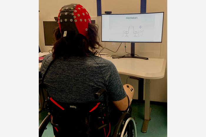 Signals from an EEG monitoring device could be used to send brain signals to a spinal cord stimulator