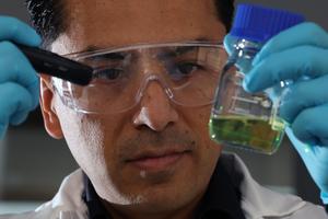 Research associate Dr Juan Medina inspecting catalyst for nanoparticles