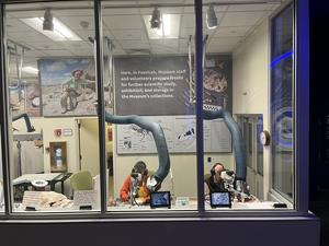 Volunteers working on Petrified Forest National Park fossils in the FossiLab at the the Smithsonian’s National Museum of Natural History
