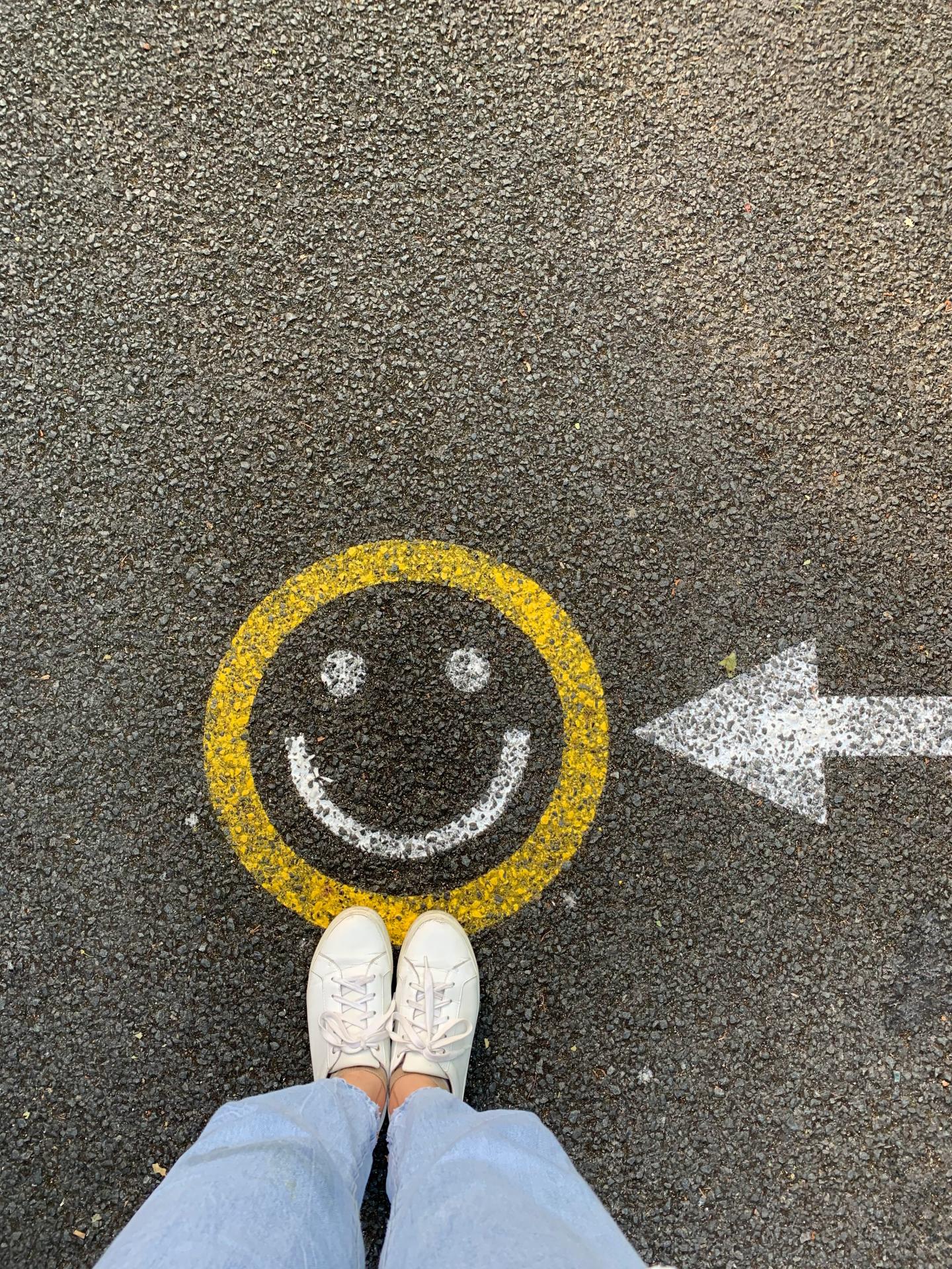 Smiley Face Painted on Cement