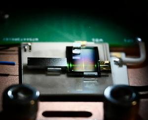 Chip-Scale Frequency Comb Source
