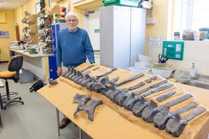 Dr. Jeremy Lockwood with the spinal column of Istiorachis macarthurae. credit University of Portsmouth